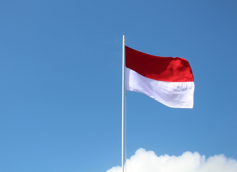 Flag of Indonesia against blue sky